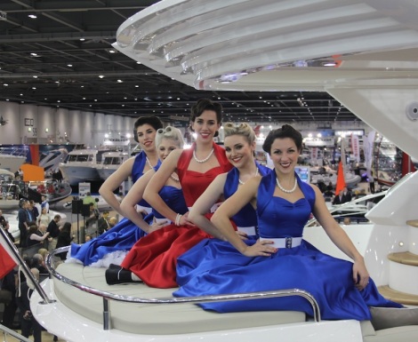 Elle & The Pocket Belles strike a pose on board the Sunseeker Manhattan 55 at the London Boat Show