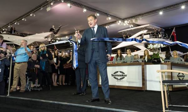 Hugh Bonneville cuts the ribbon to launch the Sunseeker stand at the London International Boat Show